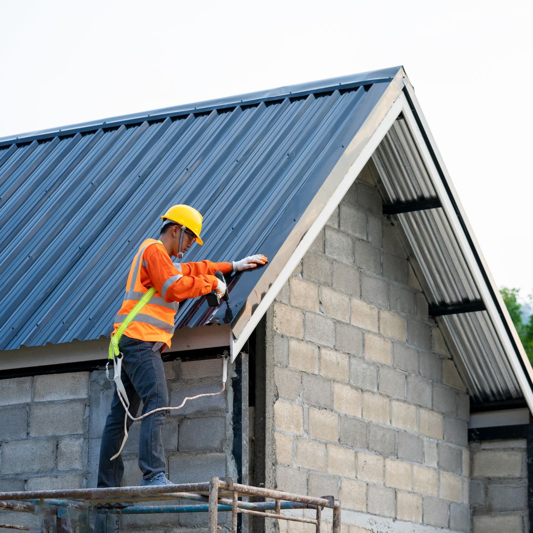 a man working on a roof