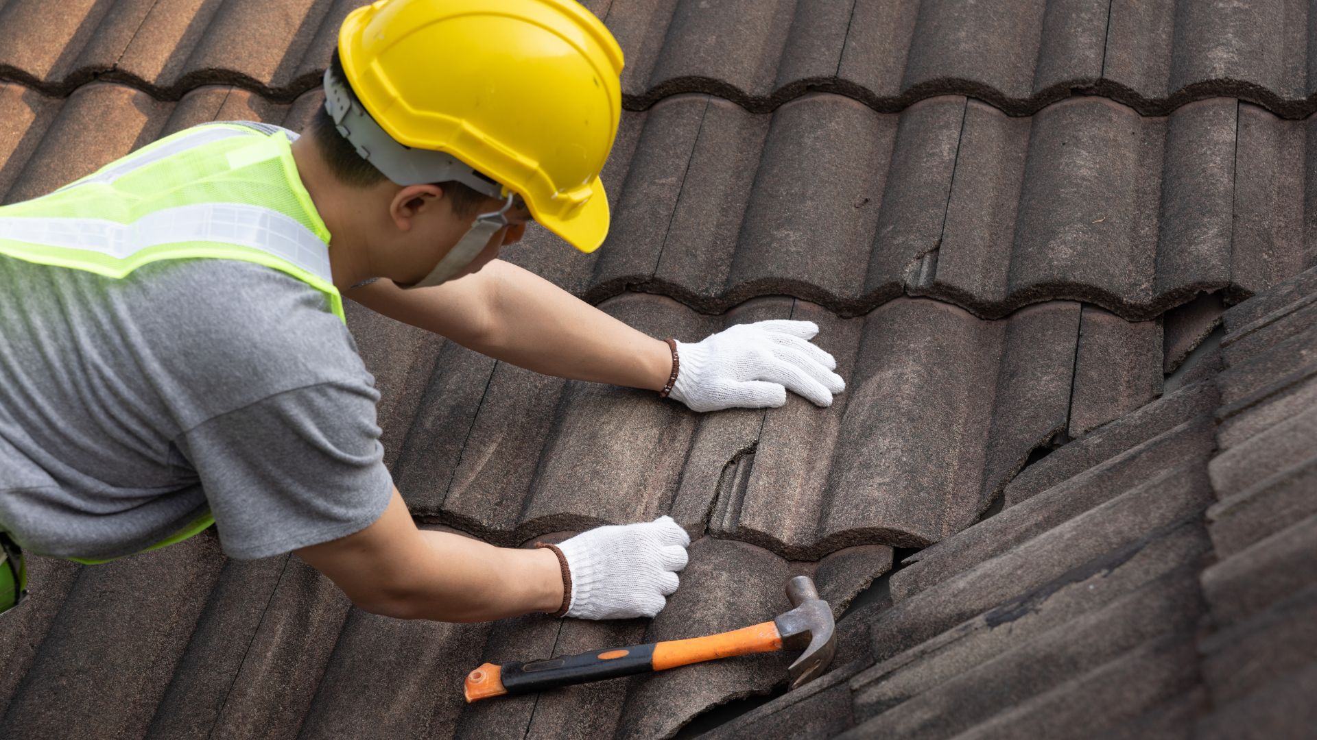 a man repairing a roof