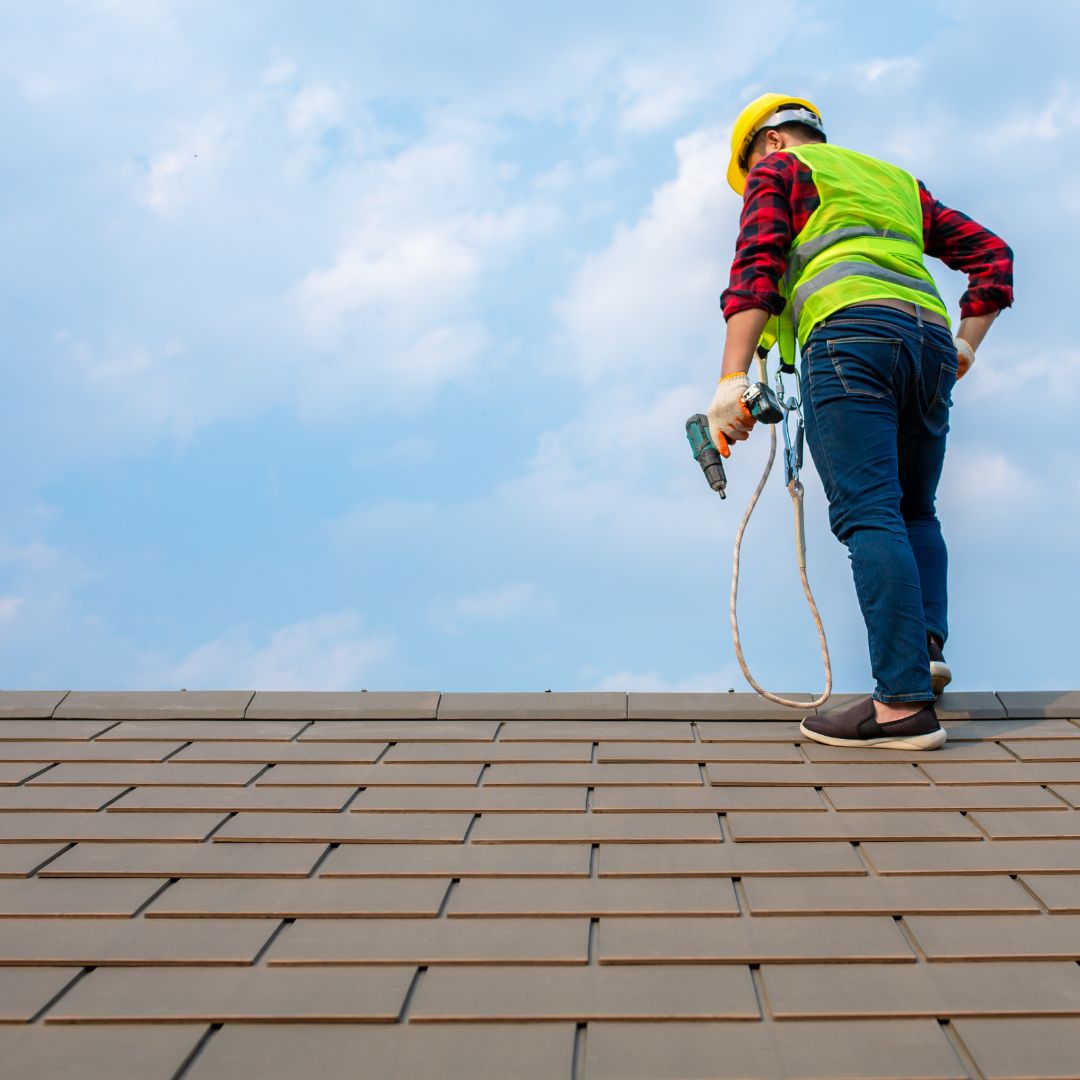 a man working on a roof